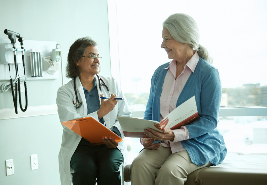 Dr. Sudha Seshadri with a patient